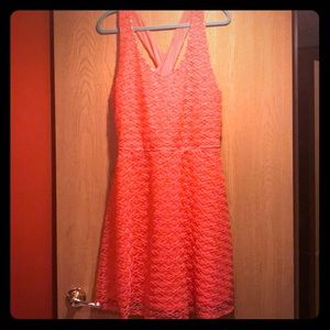Great pink/orange dress with crisscross back.
